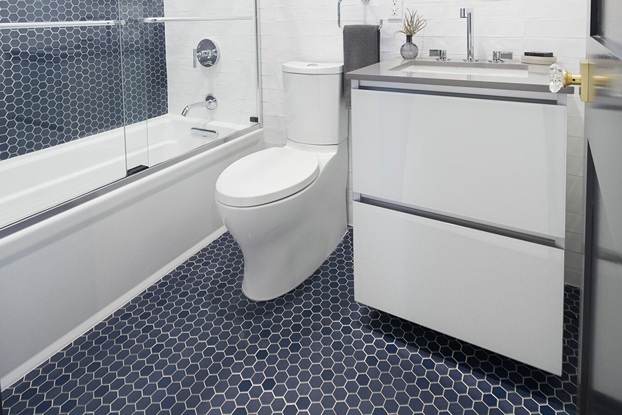 A blue hexagonal tile pattern in a modern bathroom.