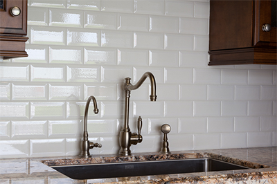 A beautiful kitchen backsplash featuring Adex tile.